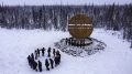 Residents of Fort Good Hope have a drum dance to celebrate the new Arctic Circle Drum monument on March 15. (photo courtesy of the Department of Industry, Tourism and Investment)