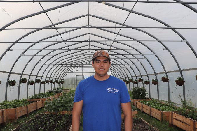 Michael Kowana is one of the people who takes care of the greenhouse.